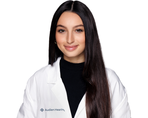 Hearing specialist wearing a white coat - mobile version